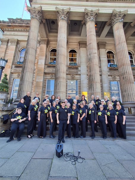 The Rock Choir performing outside the Dome in Edinburgh during the Fringe Festival.