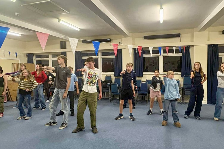 The Mayhem cast rehearse for their production of Grease