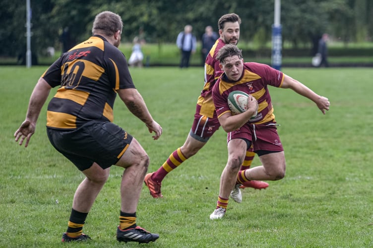 An Aber player spots a gap