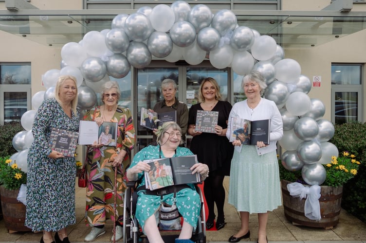 Foxhunters staff with some of the residents whose musical memories are featured in the book.
