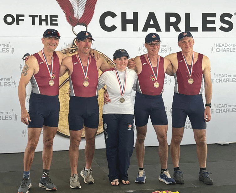 The Monmouth RC crew, with Nick Hooton right and Hannah Llewelyn-Davies centre , celebrate the first ever win by a Welsh club in the world's biggest rowing race, the Head of the Charles