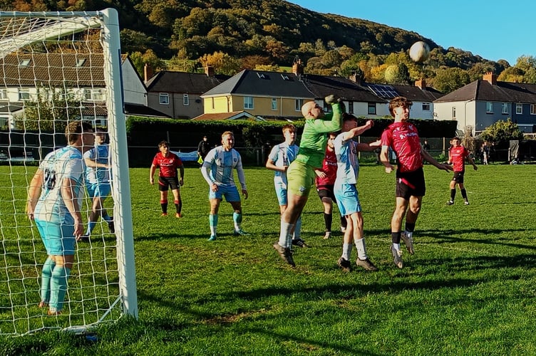 Charlie Morris is foiled by the keeper.

