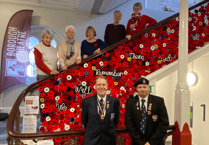 Meet the ladies who unveiled this amazing Town Hall poppy cascade