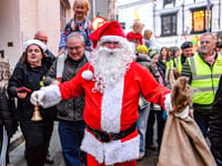 Town defies Claudia to switch on festive cheer