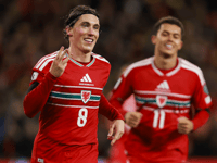 Wales in seventh heaven as Wilson fires hat-trick