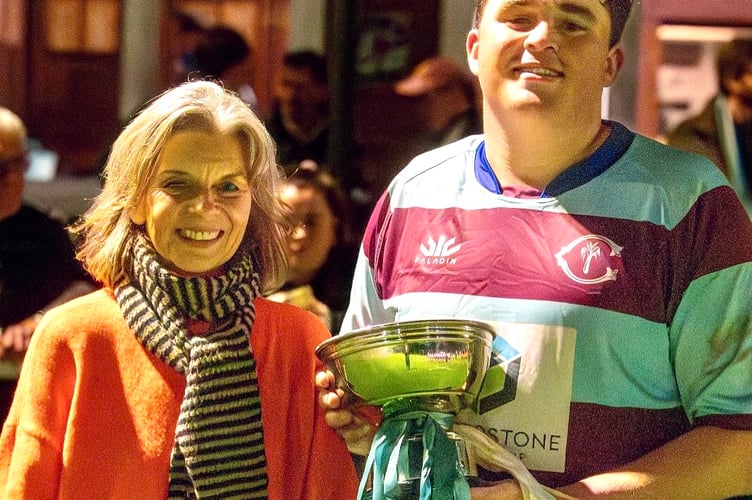 Seth and Sue Butler with the Eddie Butler Bowl after Crawshays beat Cambridge University