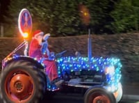 WATCH: As a trail of twinkling tractors lights up a December evening! 