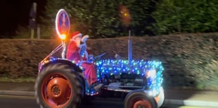WATCH: As a trail of twinkling tractors lights up a December evening! 