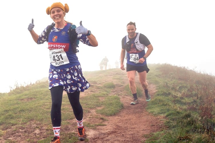 Thumbs up from a festive runner at the top of the Skirrid