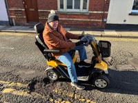 Pothole throws Usk man off mobility scooter