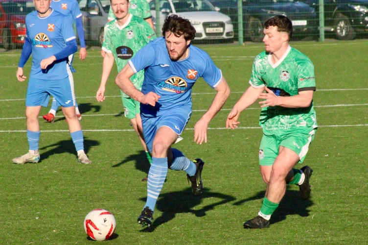 Players contest for the ball in Saturday's Caerphilly v Abergavenny clash 