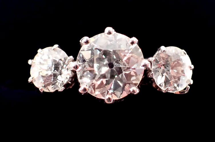 Three stone diamond ring