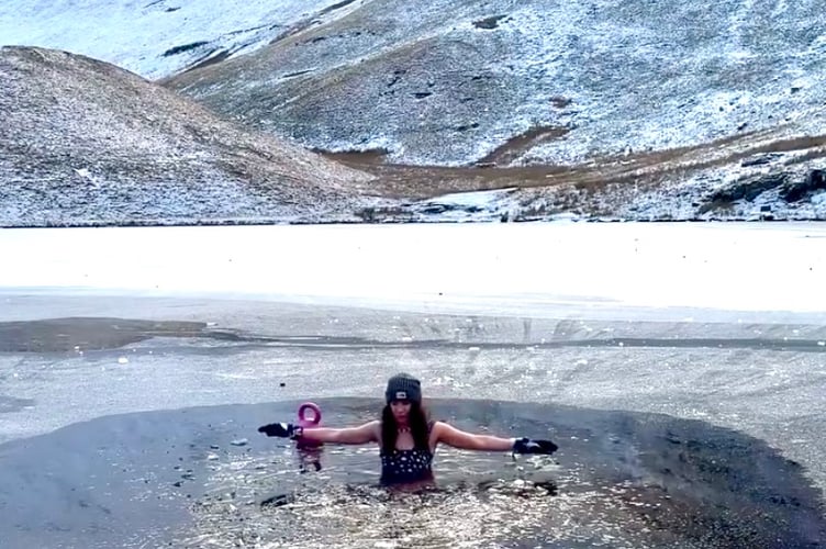 Zoe takes a dip beside Pen Y Fan