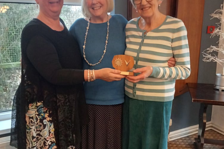Wendy Hughes presenting trophies to Judith Vickery and Jane Thompson.
