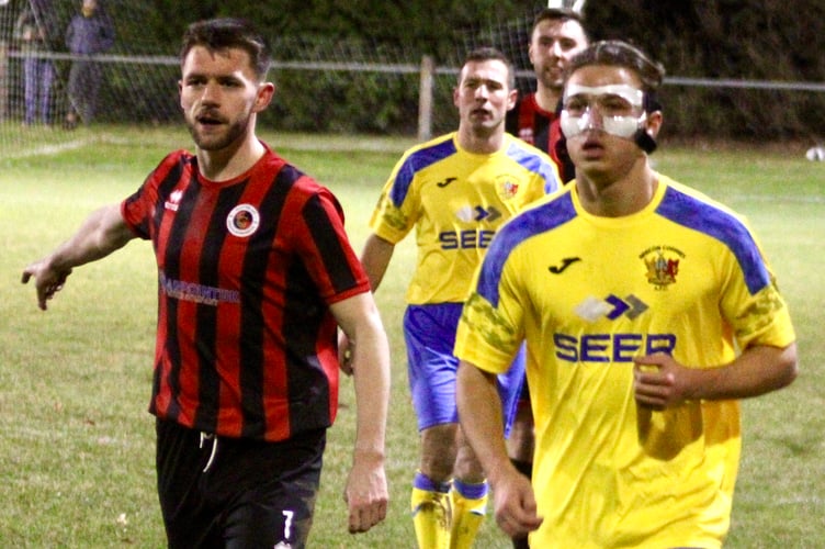 Players get ready for a corner in the Goytre v Corries match
