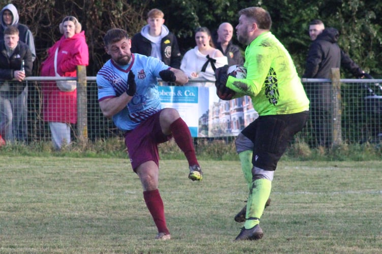 The keeper grabs the ball in the Mardy v Cwmbran game