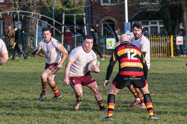 An Aber player looks for a gap