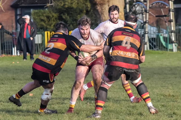 Brynmawr players halt an Aber charge