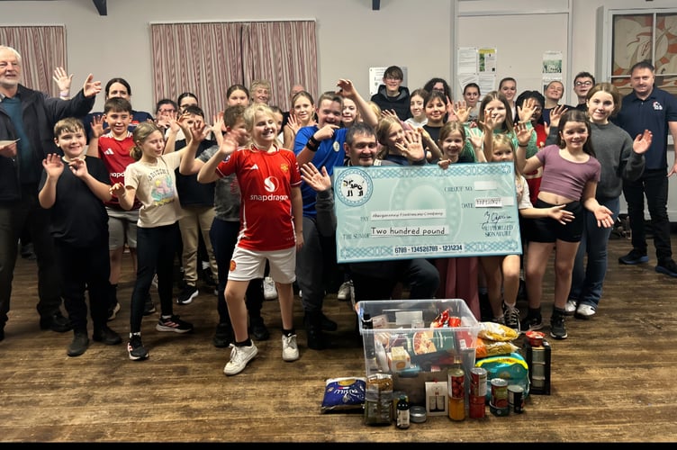 Sleeping Beauty Cast donating £200 to Paul Garnault, Food Bank Manager, Abergavenny.