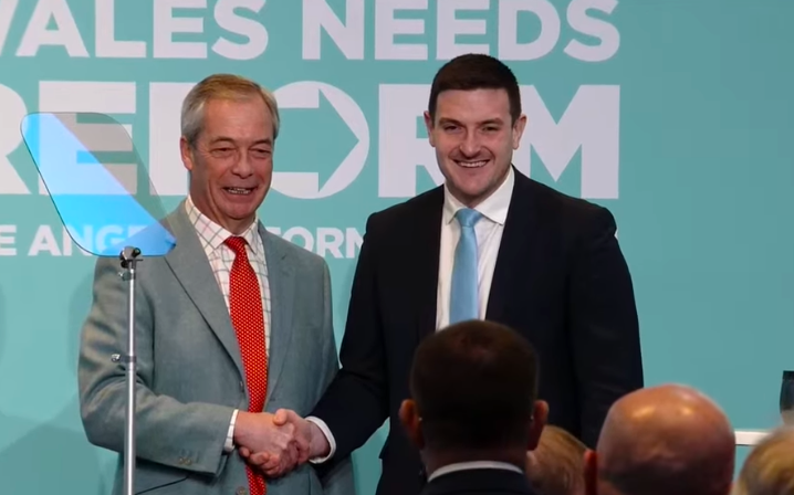 James Evans pictured with the leader of Reform UK during this morning's announcement