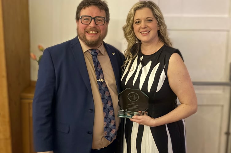 Cait Davies and Leighton Martin celebrate winning the Ken Williams award for best ensemble which went to the cast of Into the Woods