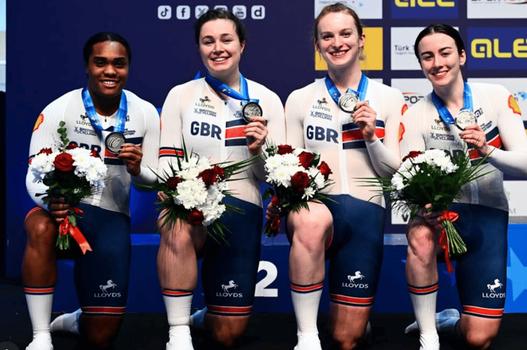 Lowri Thomas, right, celebrates European sprint silver with the GB team