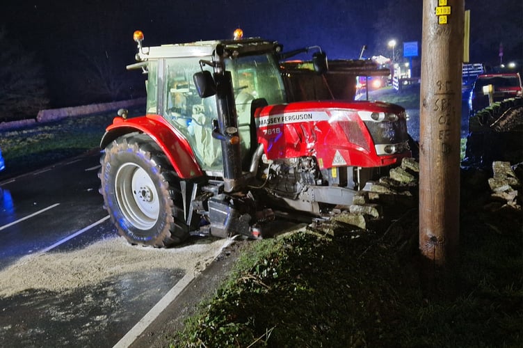 The tractor’s offside wheel was torn off in the collision on the A40