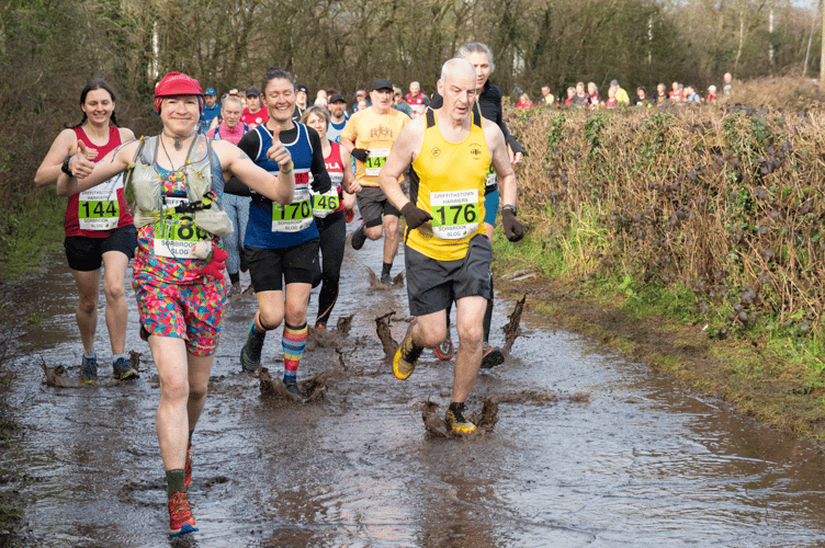 Runners had to wade through the water in the Sorbrook Slog