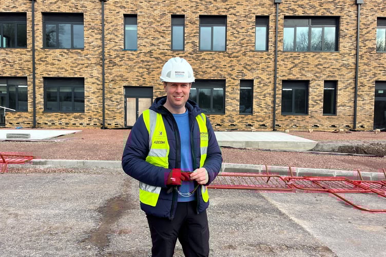 Cllr Richard John outside King Henry VIII 3-19 School