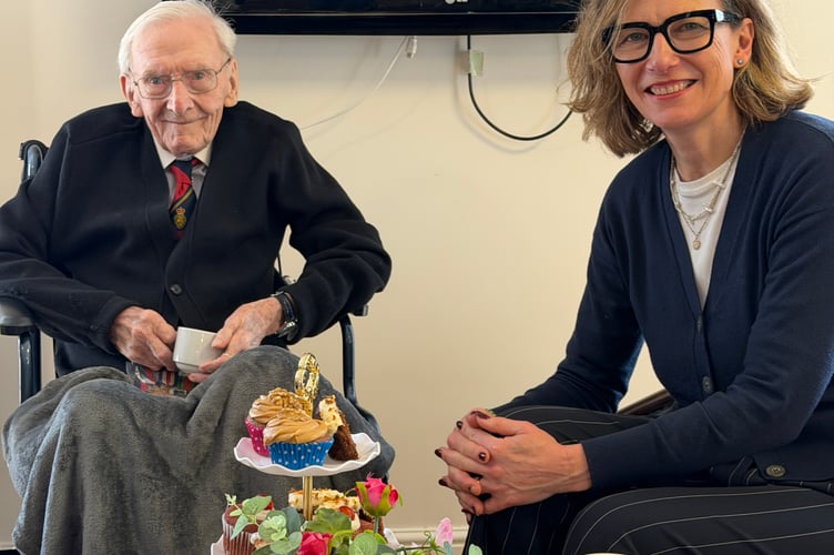 Veteran Mel Hughes with Catherine Fookes MP, celebrating his 101st Birthday.
