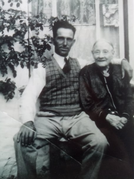 George's father with his grandmother in the 1930s.