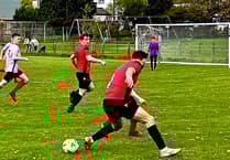 Evans above as high-flying Glo pip 10-man Mardy