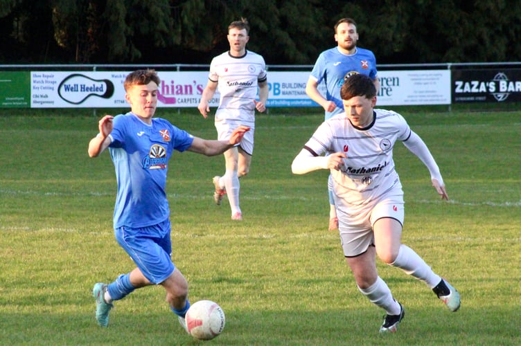 Players challenge for the ball in the Abergavenny v Cwmbran game