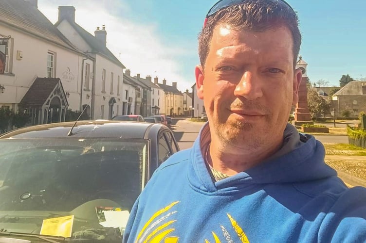 Fellow carer Jeremy Hopkins with his ticketed car