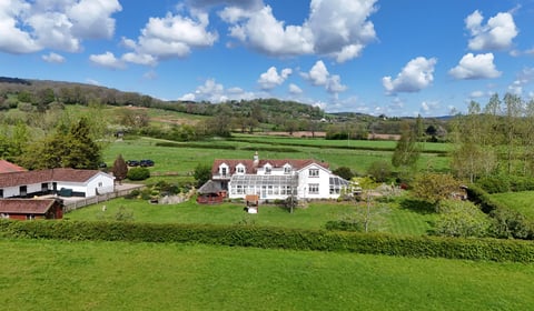 Smallholding comes with stables, indoor pool, fishing ponds and wood 