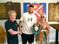 New shield presented to Tom in honour of Ron