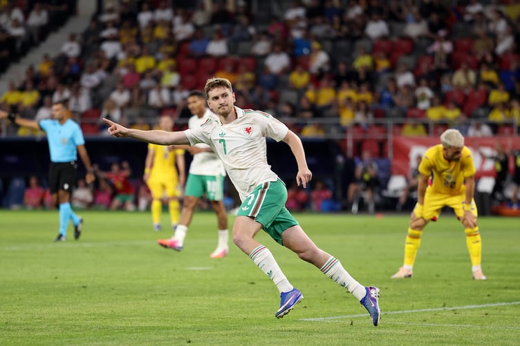 Wales' David Brooks celebrates scoring during the international friendly match against Romania at the Stadionul Steaua in Bucharest. Photo: John Smith/FAW