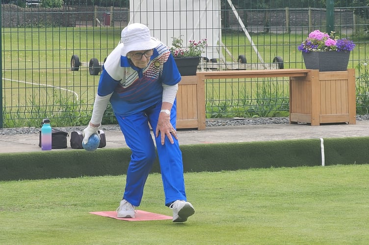 An Abergavenny player prepares to bowl