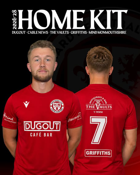 Player Max Williams shows off Mardy FC’s new home shirt
