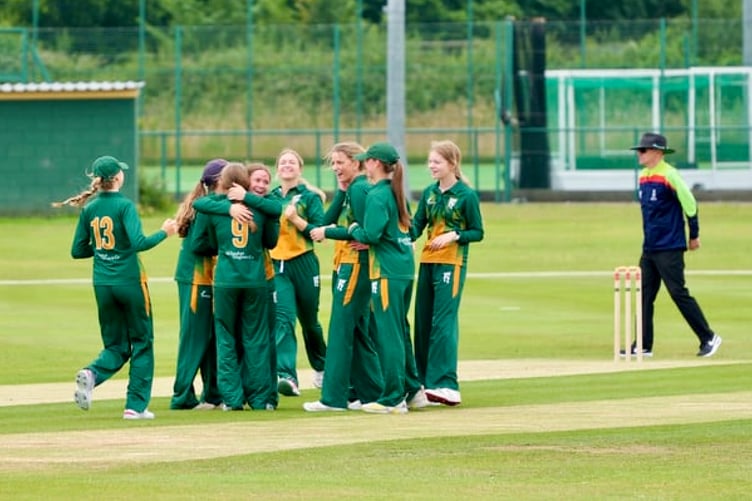Girls celebrate a wicket at Christ College Brecon