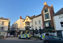 Man in 40s found dead outside town centre property