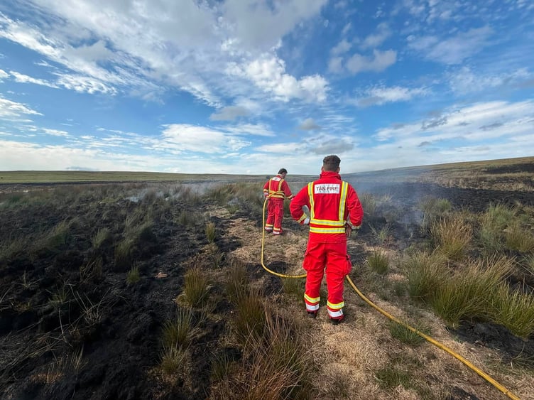 Firefighters at a grass fire near Tredegar