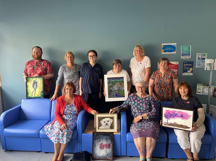 The Crafting 4 Cancer group has donated new furniture and paintings for the waiting room at Nevill Hall 2/2 ward.