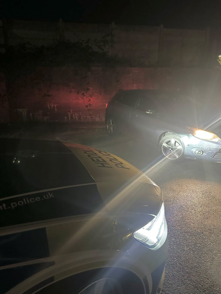 Police officers stop a stolen vehicle in Brynmawr