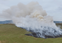 Llangynidr mountain fire latest: helicopter flown in to support firefighters