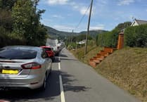 A local councillor has been using two cars to help ferry people hit by road closures