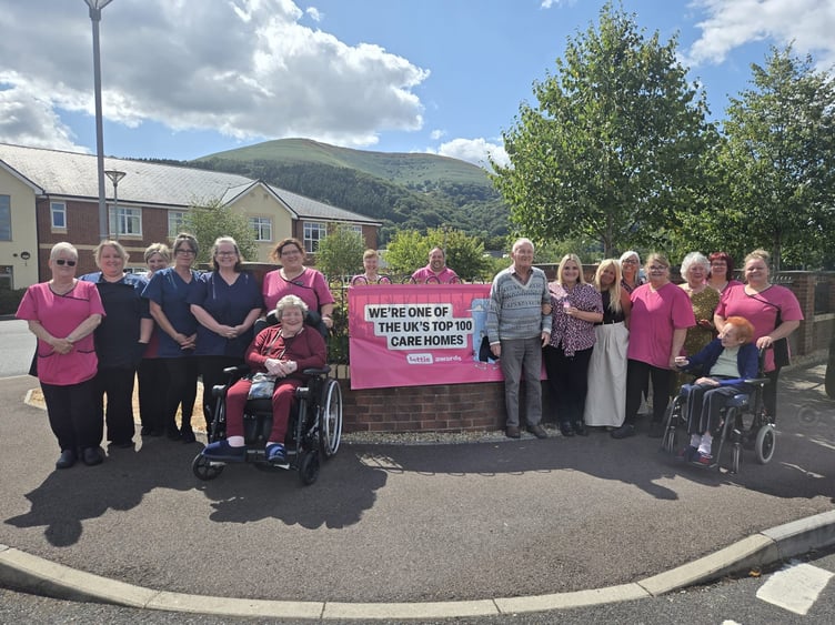 Staff celebrate their achievement at Foxhunters, Llanfoist
