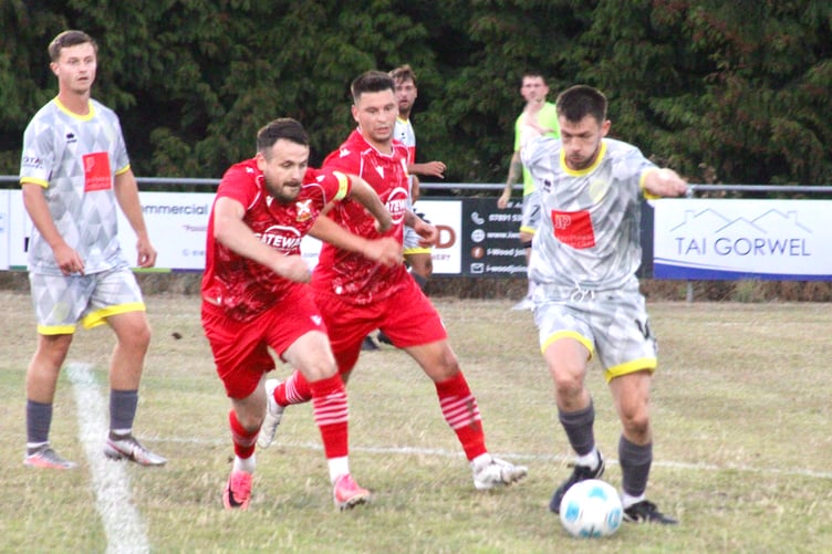 A Chepstow player evades the Pennies in their FAW Trophy clash