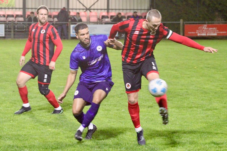 A Goytre player beat his Cwmbran rival to the ball