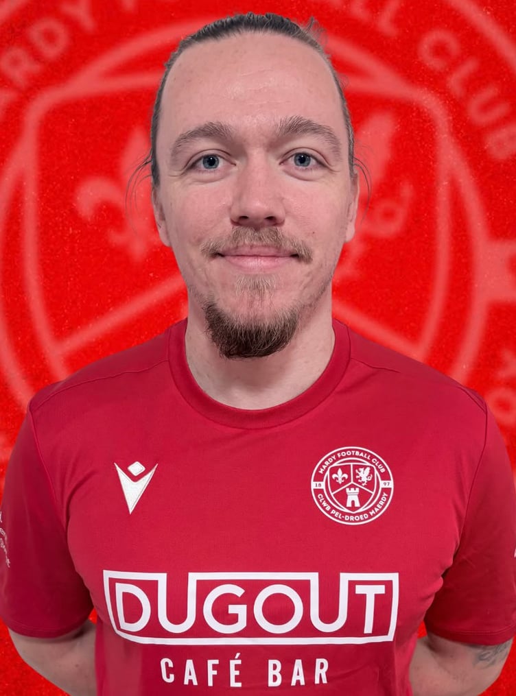 It proved an eventful Mardy debut for Stephen Dempsey, who hit the post before being knocked out in a clash of heads